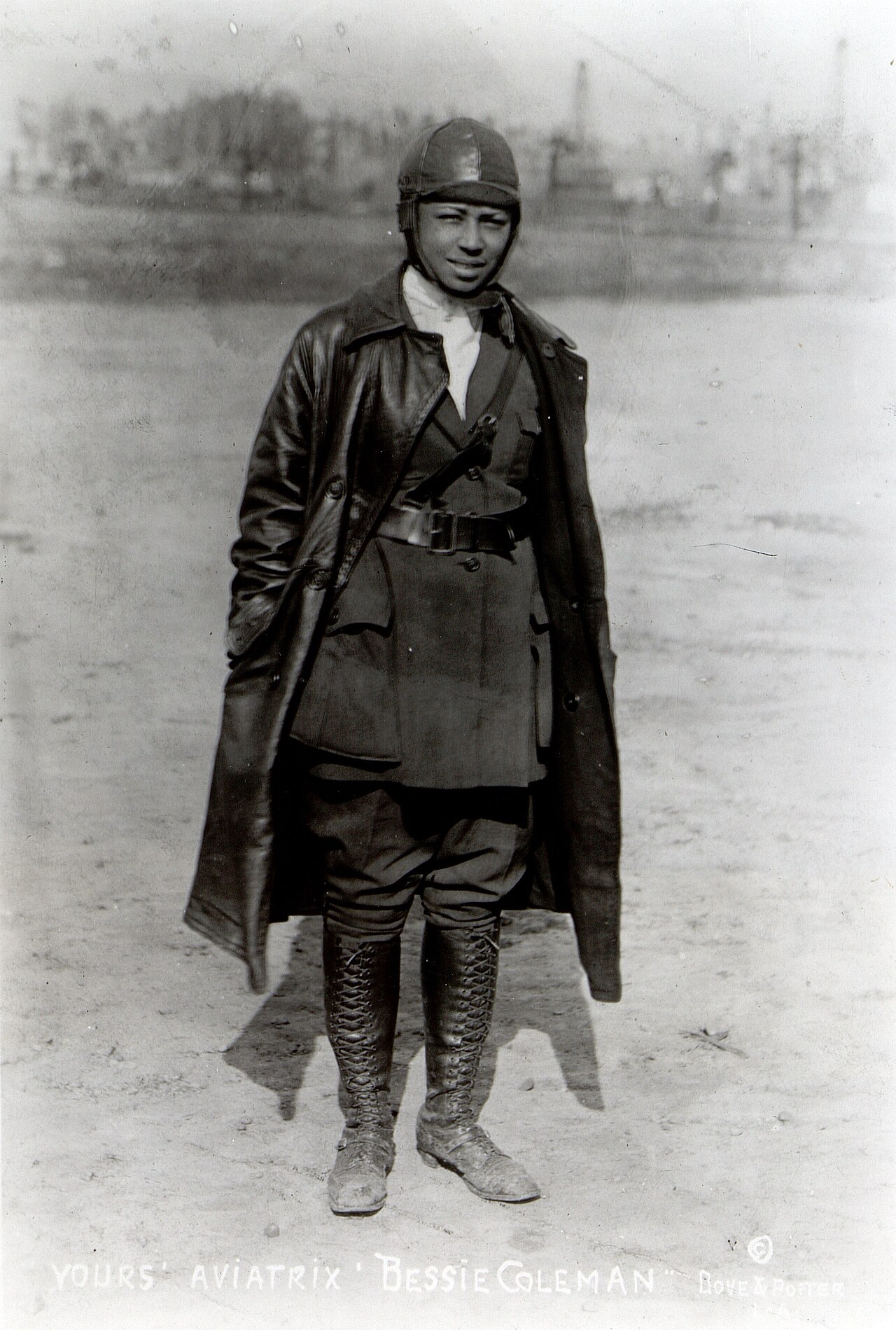 Black and white photograph of aviator Bessie Coleman in a leather cap